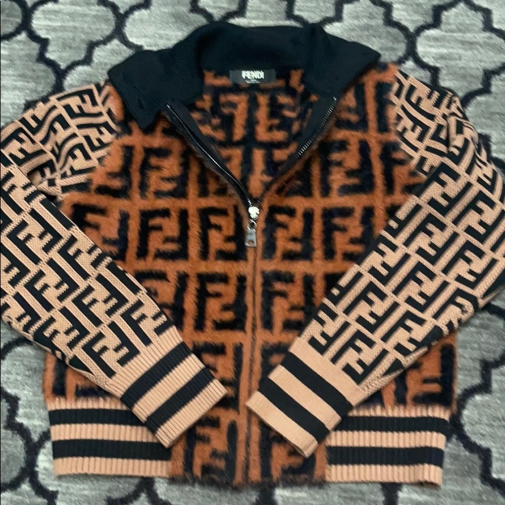 Super cute Fendi sweater size small perf condition